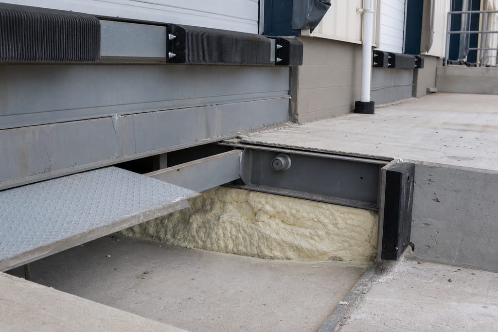 Void-fill foam near dock leveler pits photo